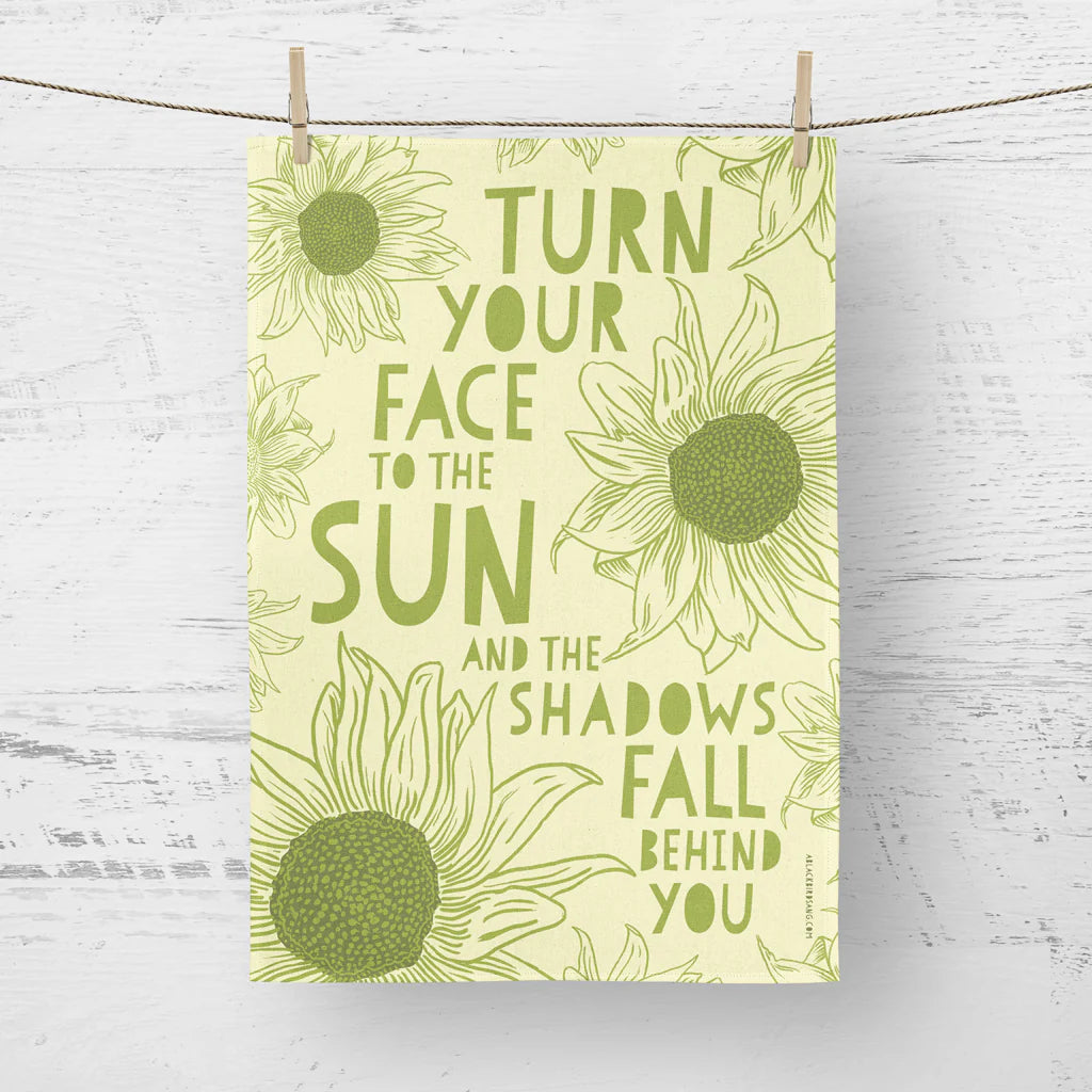 Tea towel - Turn your face to the sun and the shadows fall behind you