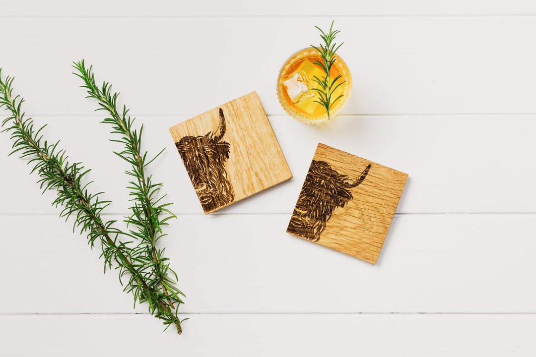 2 Highland Cow Oak Coasters